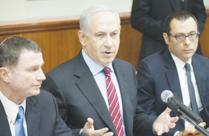 Netanyahu at cabinet meeting 370 (photo credit: Emil Salman/Haaretz, poo)