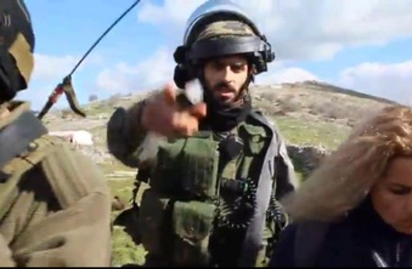 Palestinian activists, soldiers clash at  Al-Manatir 370 (photo credit: YouTube Screenshot)