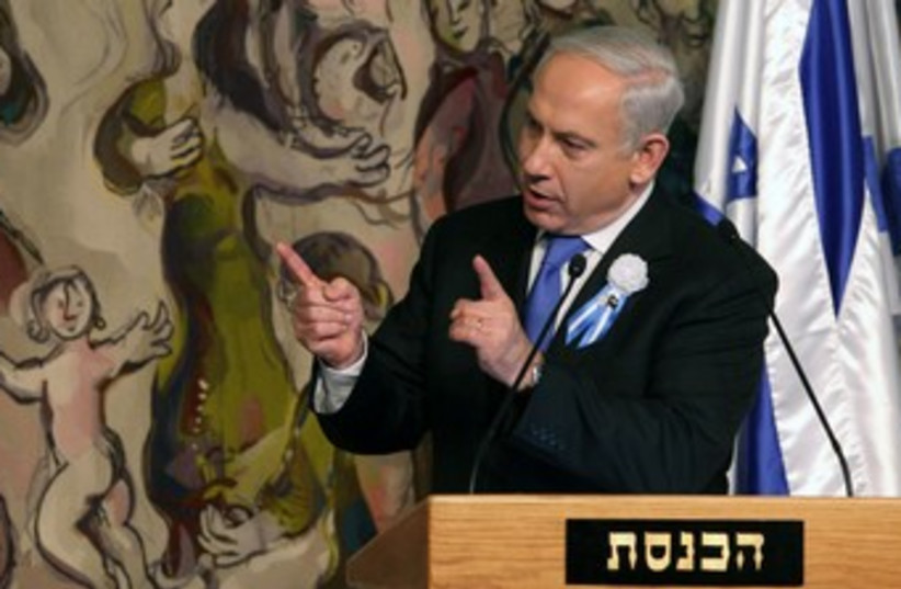 Netanyahu at Knesset swear in 370 (photo credit: Marc Israel Sellem/The Jerusalem Post)
