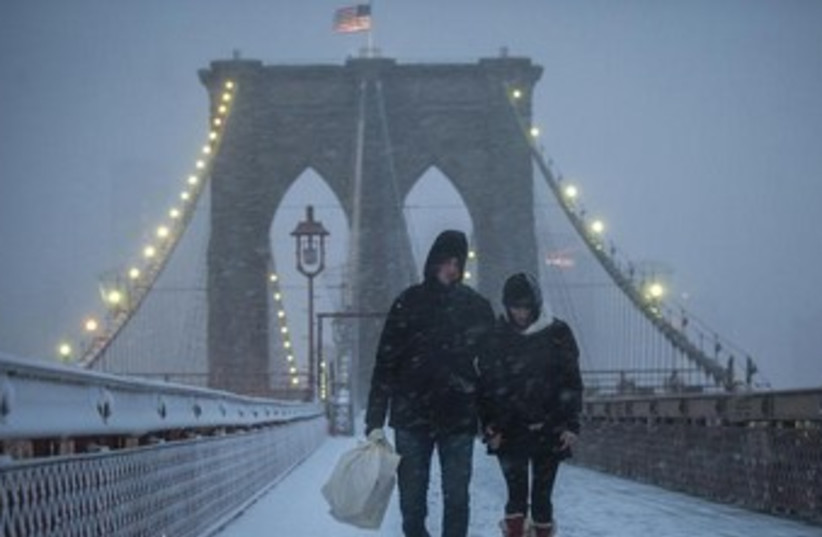 Brooklyn Bridge in blizzard 370 (photo credit: REUTERS)