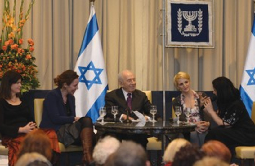 President Shimon Peres with female writers panel 370 (photo credit: Marc Nieman/GPO)