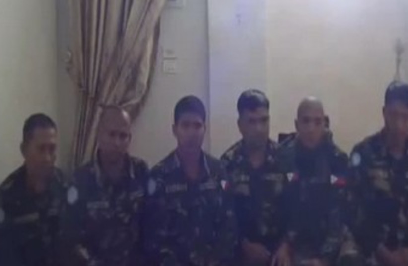 UN peacekeepers held by Syria rebels 370 (photo credit: YouTube Screenshot)