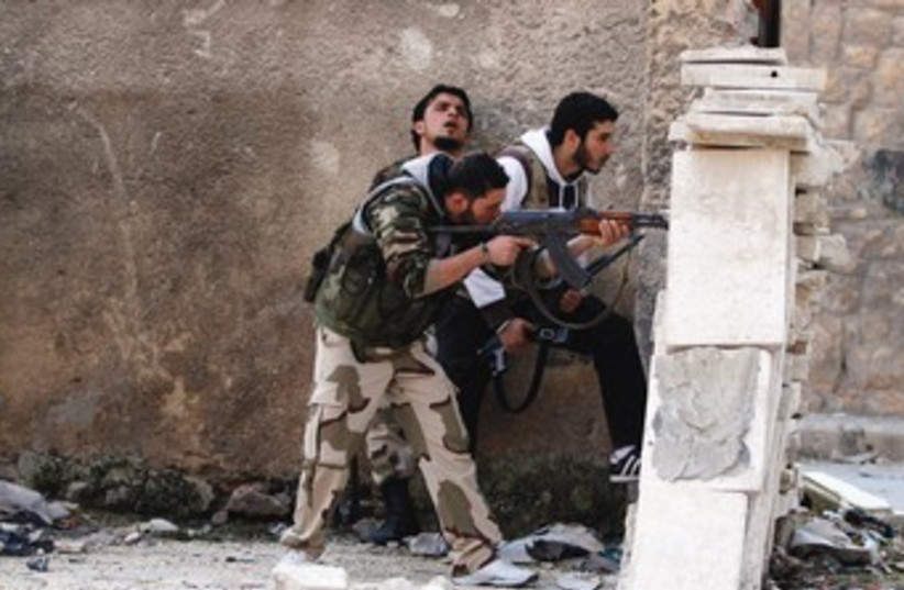 Syrian opposition fighters 370 (photo credit: REUTERS)