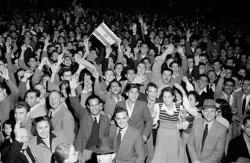 Jews rejoicing in the streets after UN vote 370 (photo credit: Jerusalem Post archives)