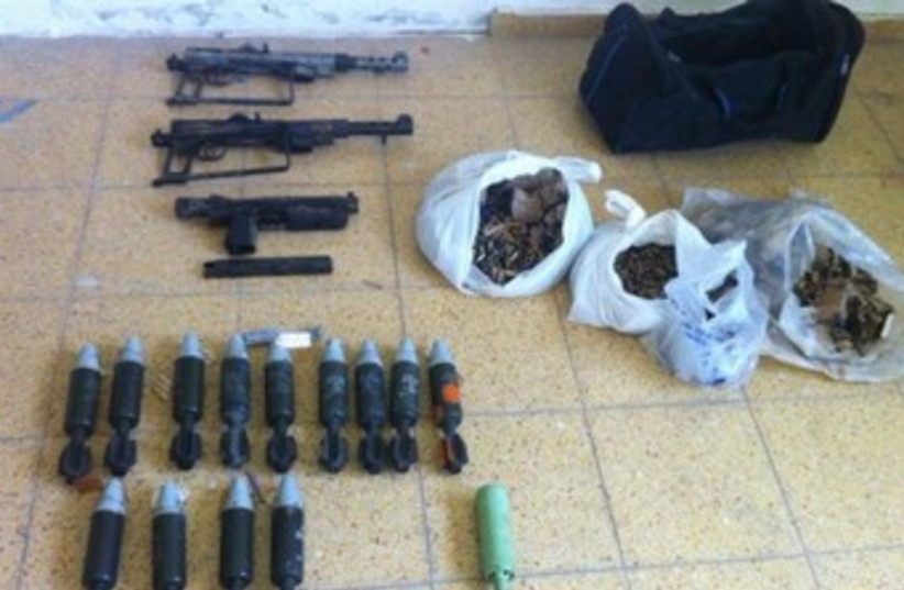 Mortar shells, guns found stashed in school in Abu Sanan (photo credit: Israel Police)