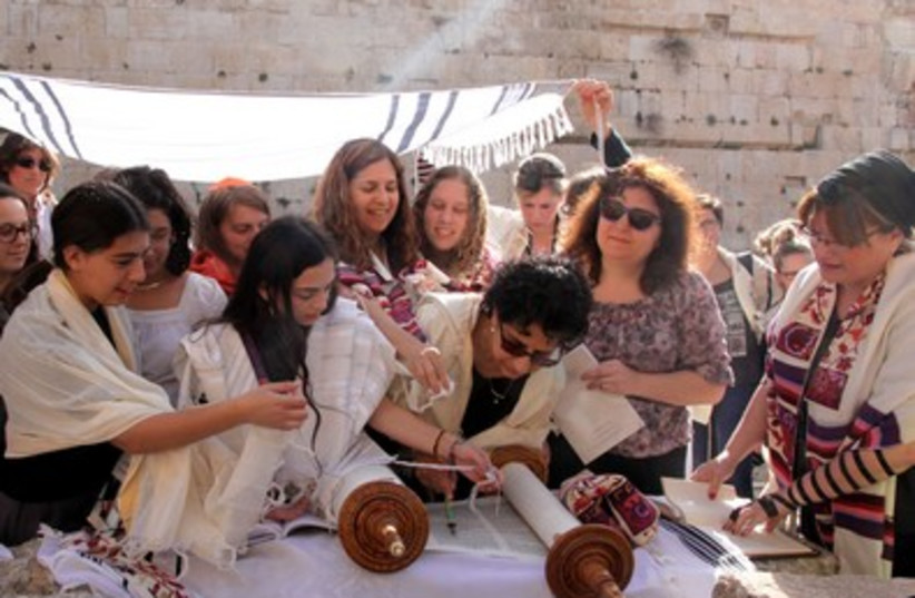 Women and girls together with Torah scroll at Western Wall