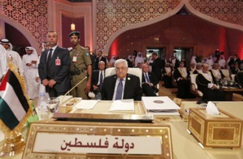 PA President Mahmoud Abbas at Arab League summit, Doha (photo credit: REUTERS/Ahmed Jadallah)