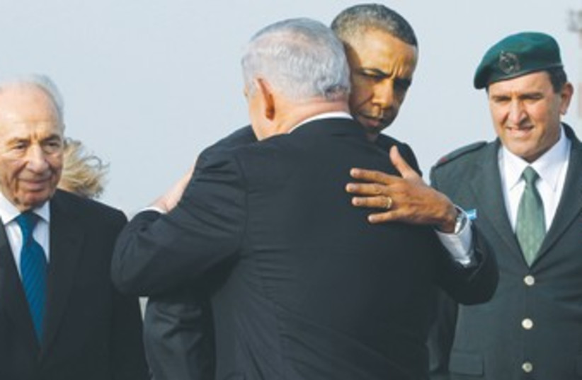 Obama hugging Bibi Peres bckgrnd 370 (photo credit: REUTERS)