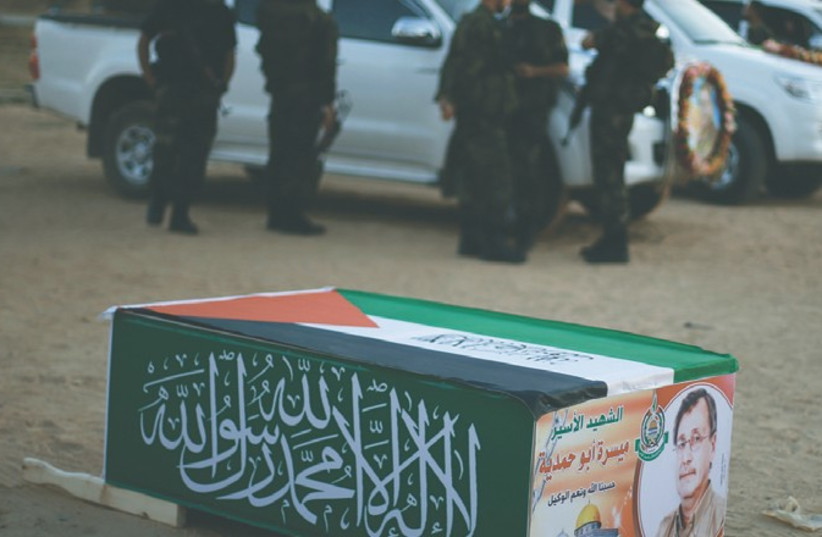 Abu Hamdiyeh370 (photo credit:  Suhaib Salem/Reuters)