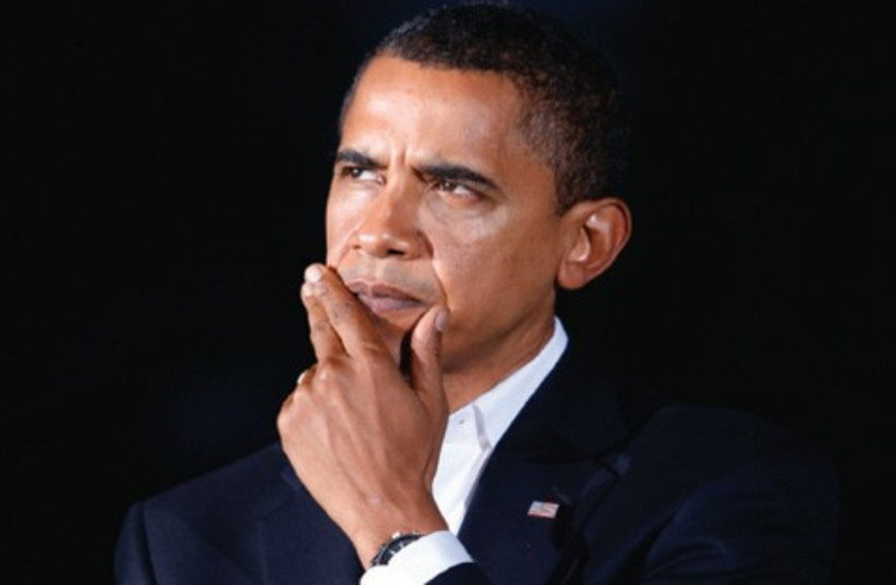 Obama Thinking521 (photo credit: Jason Reed/REUTERS)