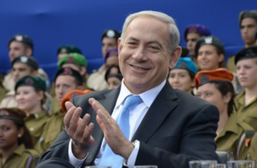 Netanyahu clapping, big smile 370 (photo credit: Amos Ben-Gershom/GPO)