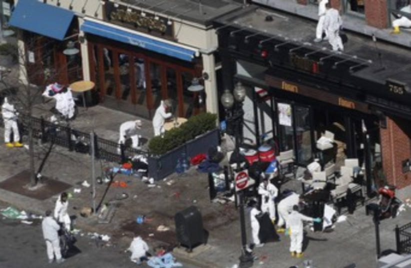 Investigators at Boston bombing scene 370 (photo credit: REUTERS)