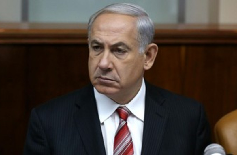 Netanyahu at cabinet meeting 370 (photo credit: Amit Shabi/Yediot Ahronot, pool)