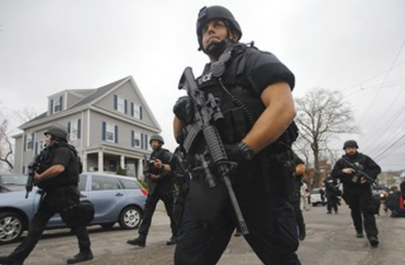 Boston police manhunt 370 (photo credit: Brian Snyder/Reuters)