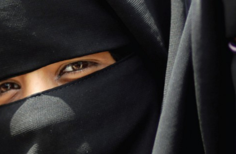 Islamic Woman521 (photo credit: MOHAMMED SALEM REUTERS)