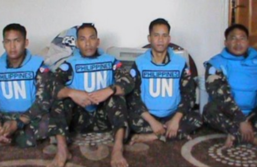 Photo of detained peacekeepers released by Syrian rebels 370 (photo credit: YouTube Screenshot)