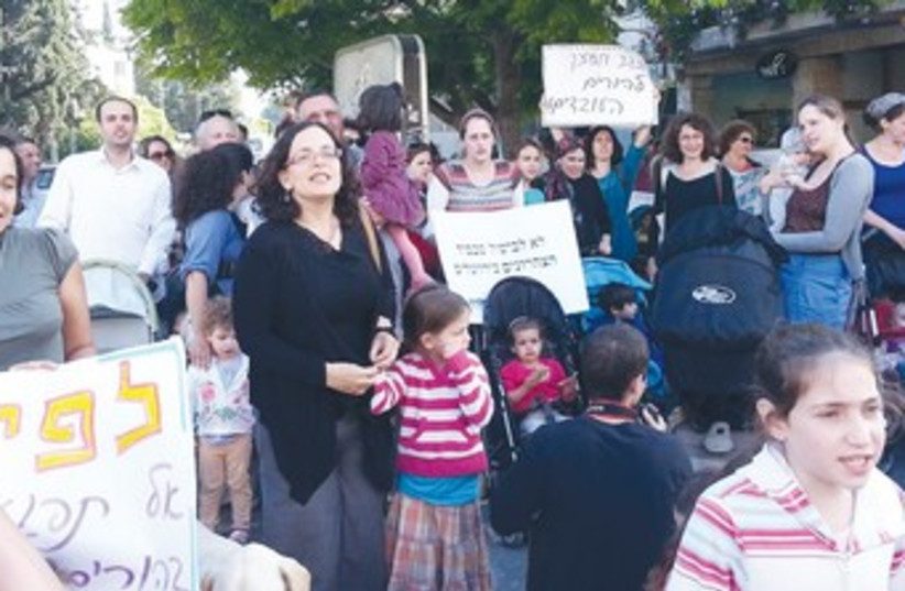 WORKING PARENTS and their children in "march of strollers" 3 (photo credit: Marik Shtern)