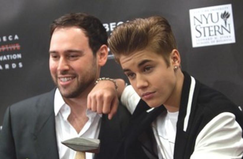 Scooter Braun and Justin Bieber 370 (photo credit: REUTERS)