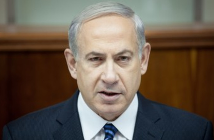 Netanyahu looking determined 370 (photo credit: Emil Salman/Haaretz/pool)
