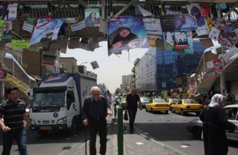 iran election posters 370 (photo credit: REUTERS)