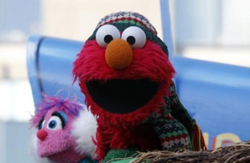 Elmo the puppet 370 (photo credit: REUTERS/Brendan McDermid )