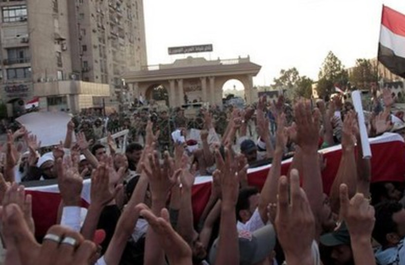 Morsi supporters stage mock funeral in Cairo, July 6, 2013