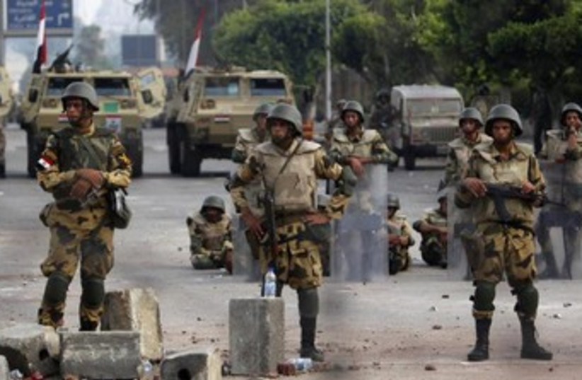 egypt Republican Guards stand in line 370 (photo credit: REUTERS)