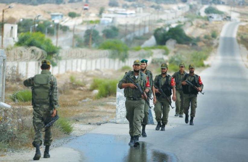 Palestinian troops loyal to Hamas on patrol 521 (photo credit: REUTERS)