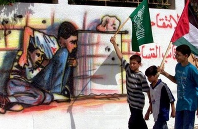 Muhammad al-Dura mural 521 (photo credit: REUTERS)