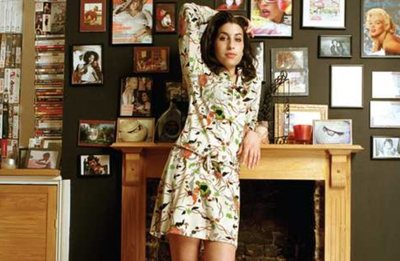 Amy Winehouse at home, 2003 (photo credit: MARKOKOH / CAMERA PRESS)
