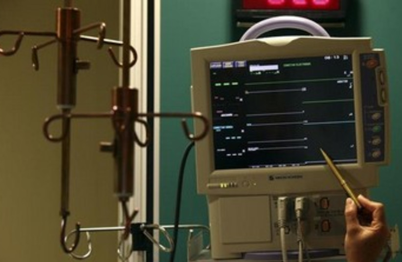 Electrocardiograph (EKG) machine 370 (photo credit: REUTERS)