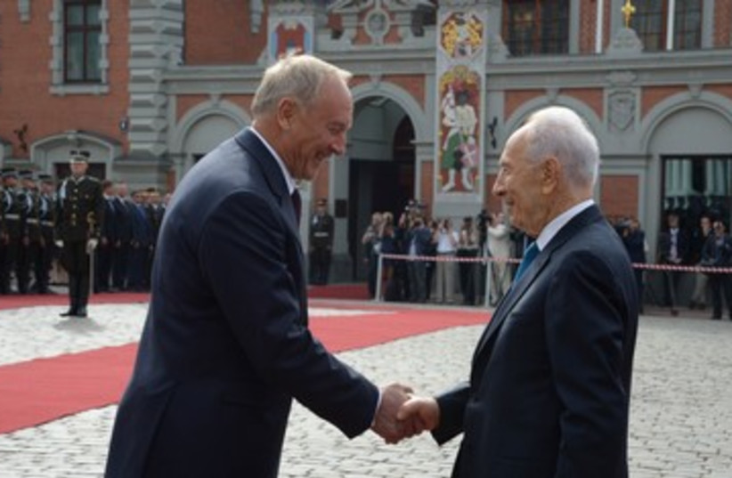 Israeli President Peres with Latvia President Riga (photo credit: GPO)