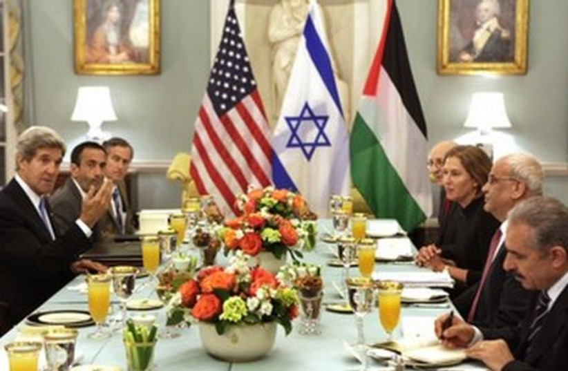 Israelis, Palestinians meeting for resumption of talks 521 (photo credit: REUTERS/Yuri Gripas)