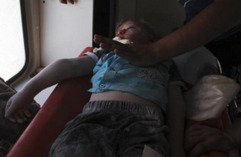 injured syrian kid 370 (photo credit: REUTERS)