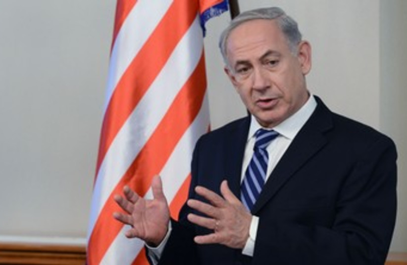 Netanyahu w american flag expressive 370 (photo credit: Kobi Gideon/GPO)