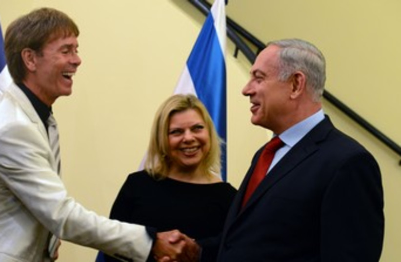 PM Netanyahu and Sara greet Cliff Richard 370 (photo credit: Koby Gideon/GPO)