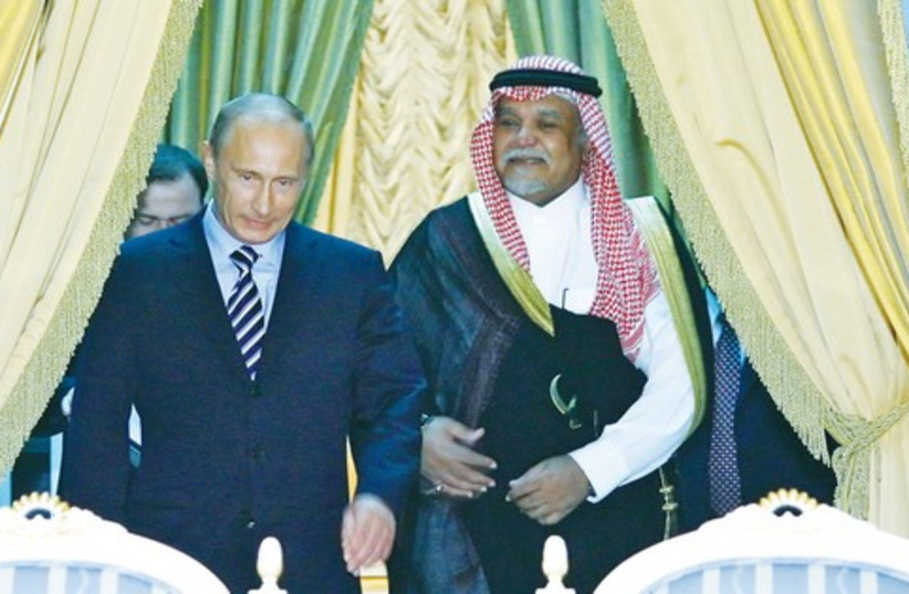 Saudi prince bin Sultan and Putin (photo credit: REUTERS)