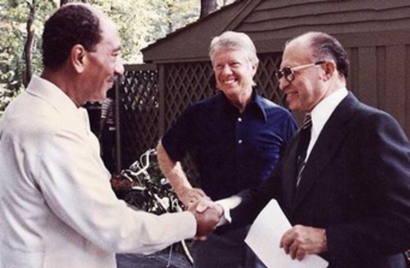 Sadat, Carter and Begin at Camp David 1978 370 (photo credit: Wikimedia Commons)