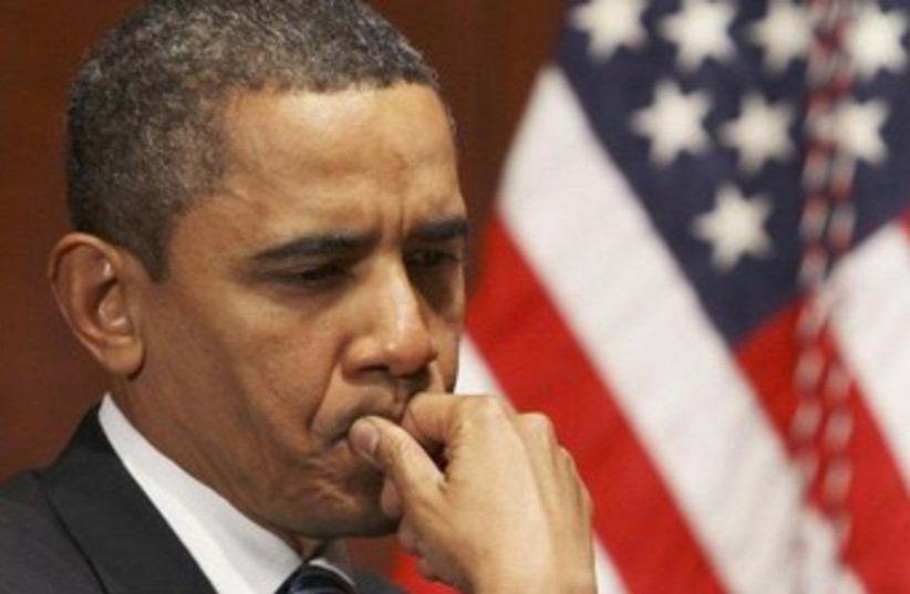 Obama looking pensive 370 (photo credit: REUTERS/Larry Downing)