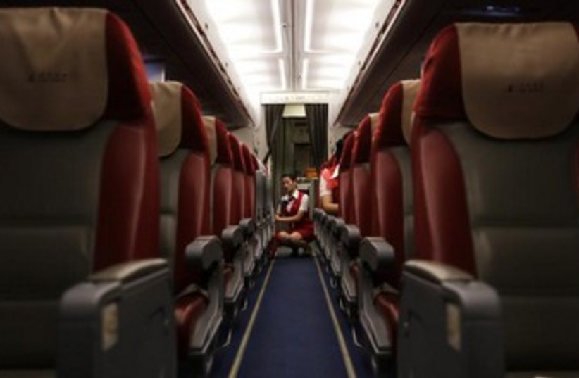 female flight attendant 370 (photo credit: REUTERS)