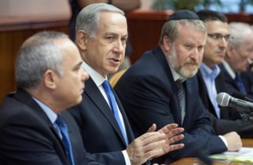Prime Minister Binyamin Netanyahu at cabinet meeting 370 (photo credit: Emil Salman / Pool)