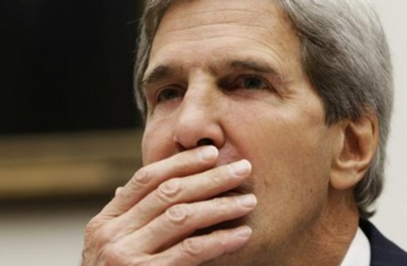 kerry covers his face 370 (photo credit: REUTERS)
