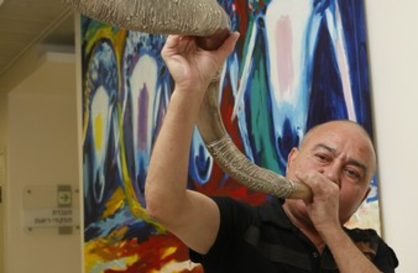 man blowing shofar370 (photo credit: Courtesy Beilinson)