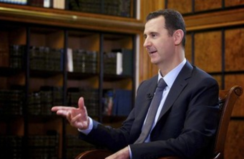 Bashar Assad gives an interview to Russian TV 370 (photo credit: Reuters)