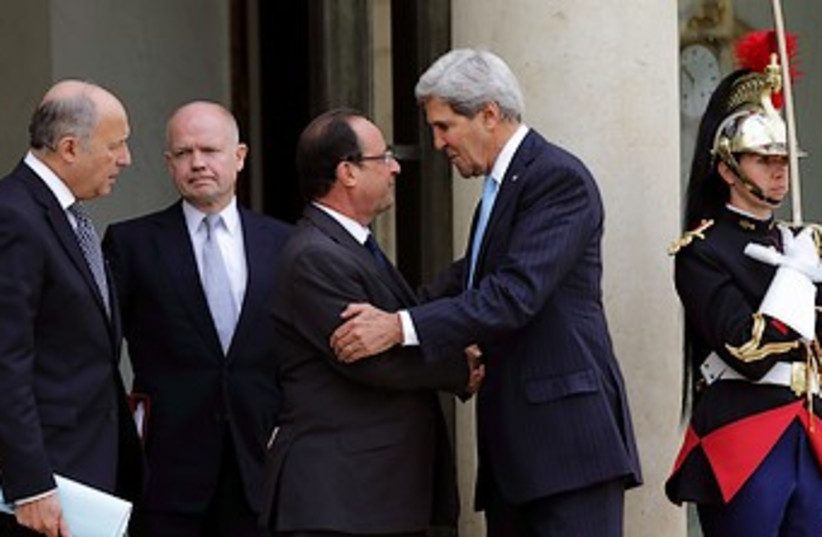 Kerry Hague Fabius and Hollande in Paris 370  (photo credit: Reuters )