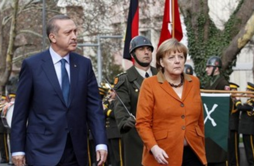Erdogan and Merkel 370 (photo credit: REUTERS)