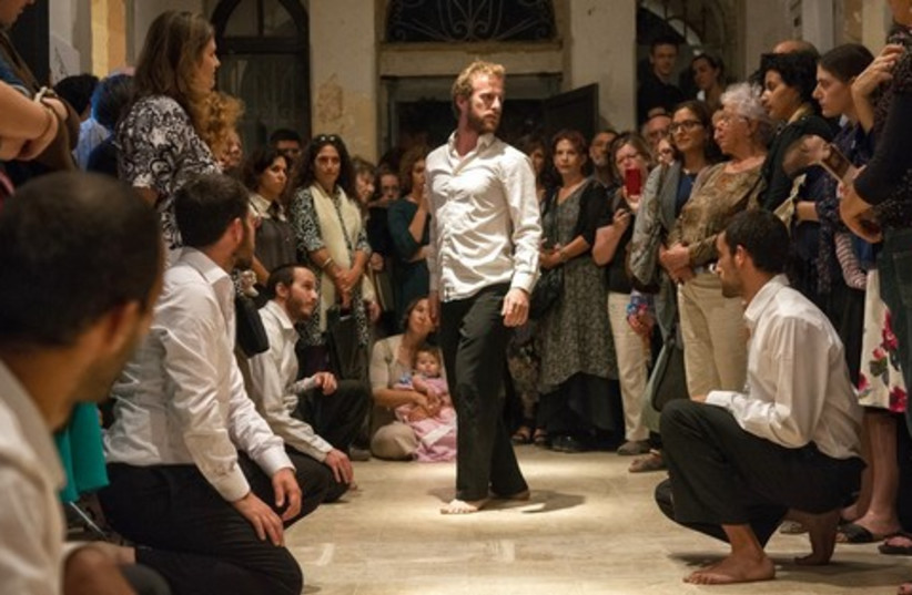 Dancers perform at the opening of the Jerusalem Biennale 370 (photo credit: David Vinocur / JTA)