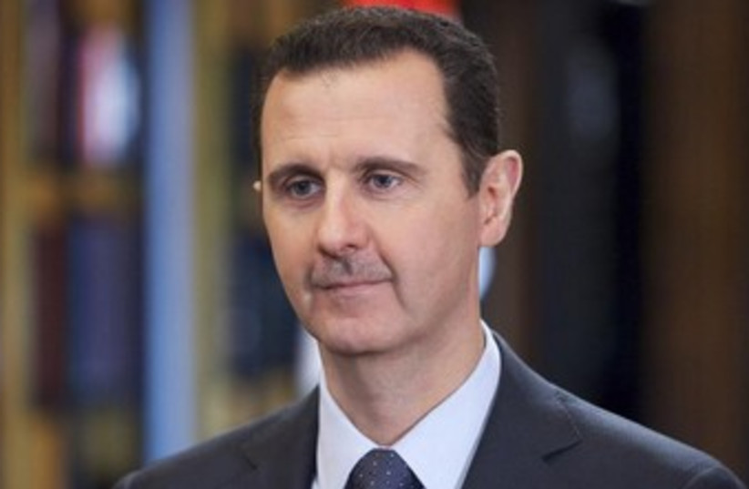 Bashar Assad gives interview 370 (photo credit: REUTERS/SANA/Handout)