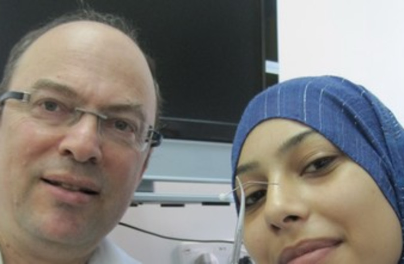 Prof. Braverman with hat pin and patient 370 (photo credit: Courtesy Hillel Jaffe Medical Center)