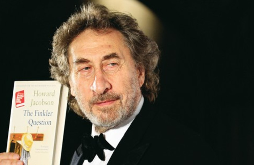 Howard Jacobson with book 521 (photo credit: REUTERS)